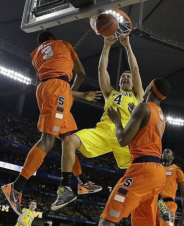 Mitch McGary (4) and Nik Stauskas (11)