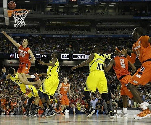 Jordan Morgan (52), Caris LeVert (23), and Tim Hardaway Jr. (10)