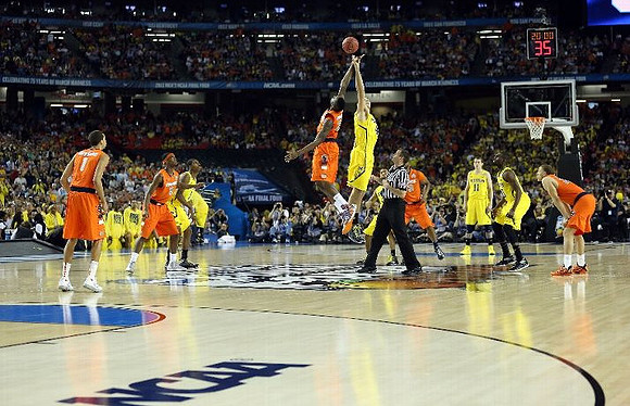 Glenn Robinson III (1), Mitch McGary (4), Trey Burke (3), Nik Stauskas (11), and Tim Hardaway Jr. (10)