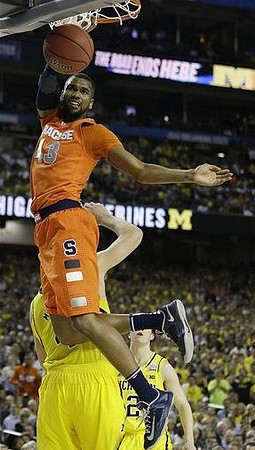 Mitch McGary (4) and Spike Albrecht (2)