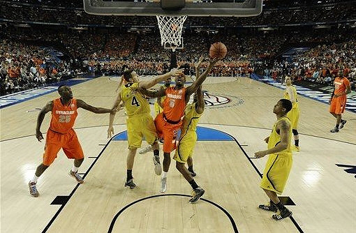 Mitch McGary (4), Glenn Robinson III (1), Tim Hardaway Jr. (10), Trey Burke (3), and Nik Stauskas (11)