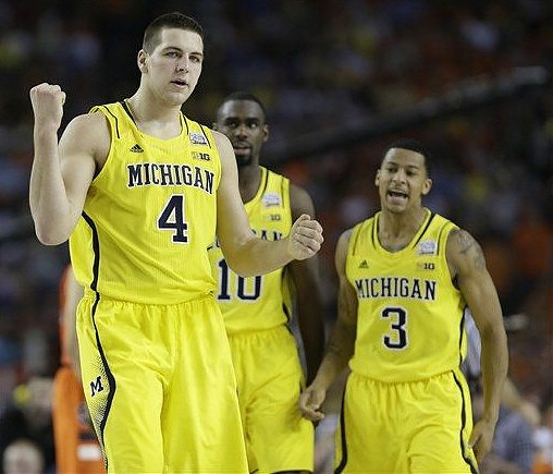 Mitch McGary (4), Tim Hardaway Jr. (10), and Trey Burke (3)