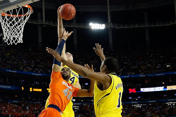 Mitch McGary (4) and Glenn Robinson III (1)