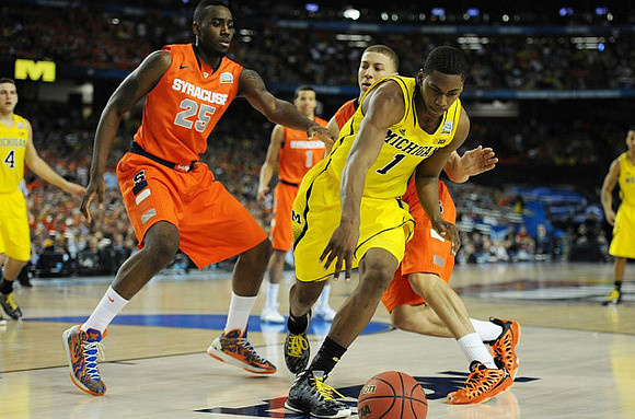 Mitch McGary (4) and Glenn Robinson III (1)