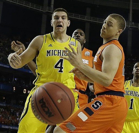 Mitch McGary (4) and Glenn Robinson III (1)