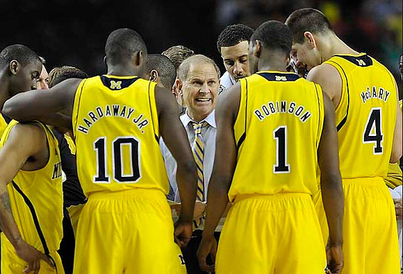 Caris LeVert (23), Tim Hardaway Jr. (10), John Beilein, Glenn Robinson III (1), Mitch McGary (4), and Jordan Morgan (52)