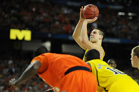 Mitch McGary (4), Caris LeVert (23), and Tim Hardaway Jr. (10)