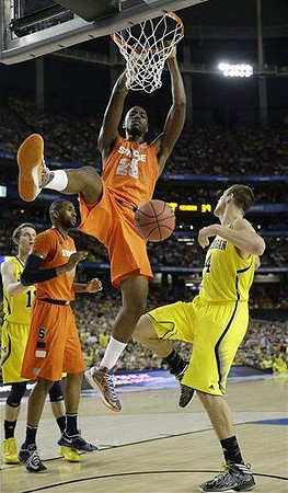 Nik Stauskas (11) and Mitch McGary (4)