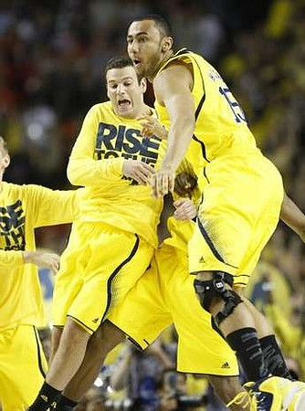 Josh Bartelstein (20) and Jon Horford (15)