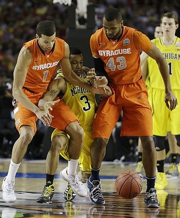 Trey Burke (3) and Nik Stauskas (11)