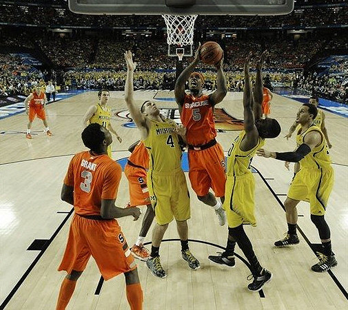Nik Stauskas (11), Mitch McGary (4), Tim Hardaway Jr. (10), Jordan Morgan (52), and Trey Burke (3)