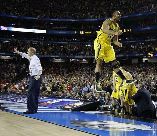 John Beilein, Jon Horford (15), Spike Albrecht (2), Mitch McGary (4), and Jeff Meyer