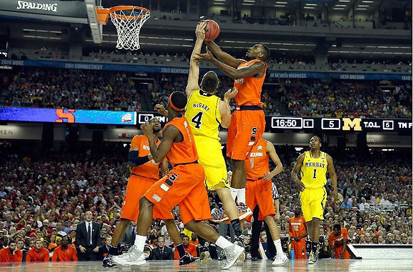 Mitch McGary (4) and Glenn Robinson III (1)