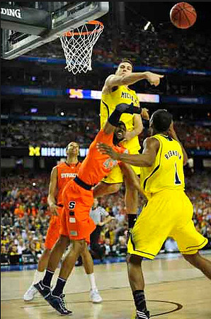 Mitch McGary (4) and Glenn Robinson III (1)