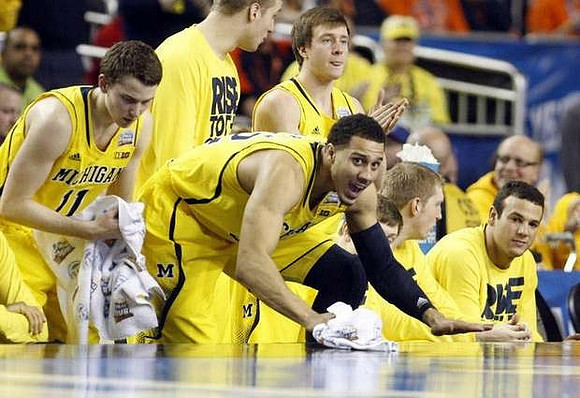 Nik Stauskas (11), Jordan Morgan (52), Max Bielfeldt (44), Spike Albrecht (2), Matt Vogrich (13), Blake McLimans (22), and Josh Bartelstein (20)