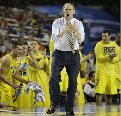 Mitch McGary (4), Nik Stauskas (11), Max Bielfeldt (44), John Beilein, and Josh Bartelstein (20)