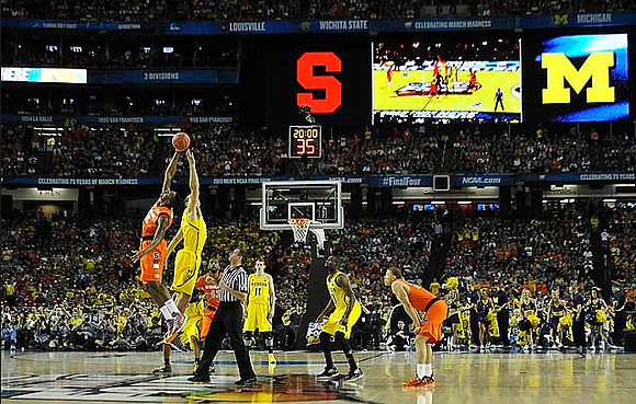 Mitch McGary (4), Nik Stauskas (11), and Tim Hardaway Jr. (10)
