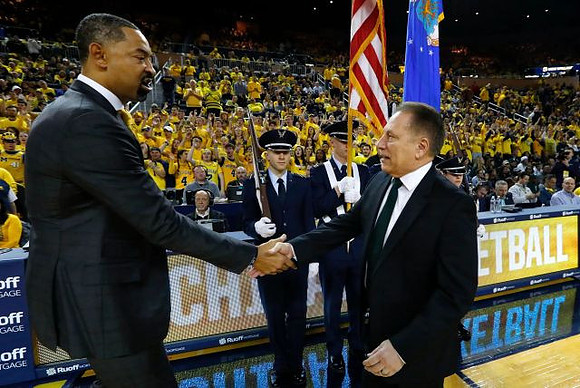 Juwan Howard and Michigan State Head Coach Tom Izzo