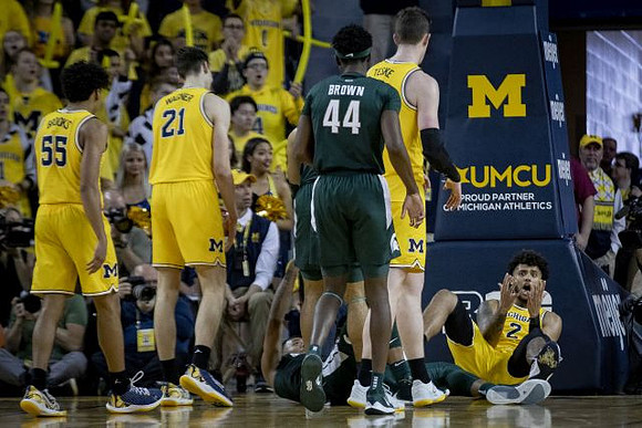 Eli Brooks (55), Franz Wagner (21), Jon Teske (15), and Isaiah Livers (2)