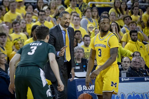 Juwan Howard and Zavier Simpson (3)