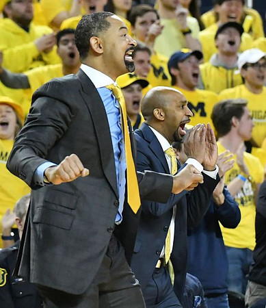 Juwan Howard and Saddi Washington