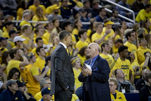Juwan Howard and Phil Martelli