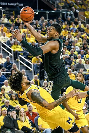 Isaiah Livers (2) and Zavier Simpson (3)