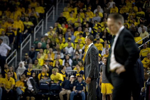 Juwan Howard and Michigan State Head Coach Tom Izzo