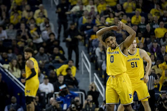 Isaiah Livers (2), David DeJulius (0), and Austin Davis (51)