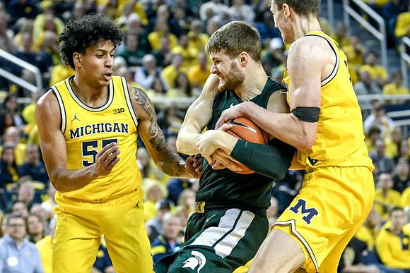 Eli Brooks (55) and Franz Wagner (21)