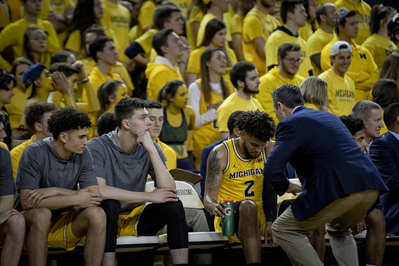 Adrien Nunez (5), Colin Castleton (11), Isaiah Livers (2), and David DeJulius (0)