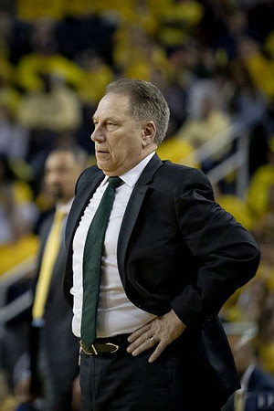 Juwan Howard and Michigan State Head Coach Tom Izzo