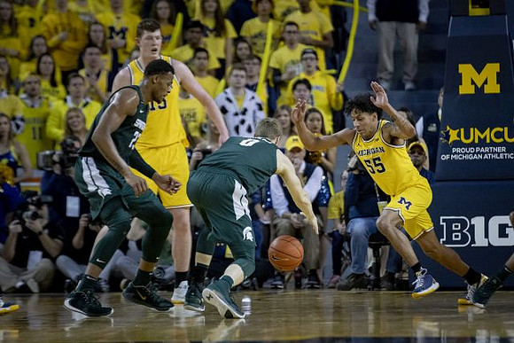Jon Teske (15) and Eli Brooks (55)