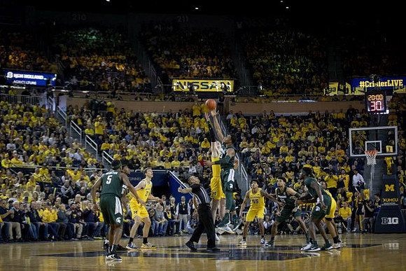 Franz Wagner (21), Jon Teske (15), and Eli Brooks (55)