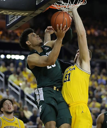 Brandon Johns Jr. (23) and Austin Davis (51)