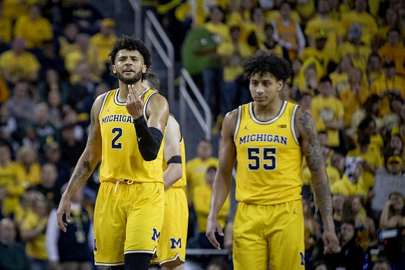 Isaiah Livers (2), Franz Wagner (21), and Eli Brooks (55)