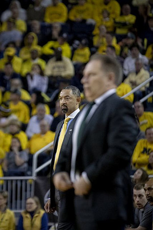 Juwan Howard and Michigan State Head Coach Tom Izzo