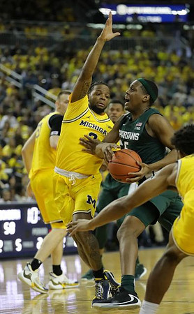 Austin Davis (51), Zavier Simpson (3), and Eli Brooks (55)