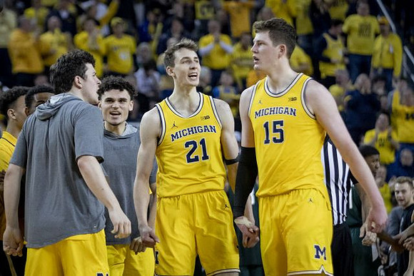C.J. Baird (24), Adrien Nunez (5), Franz Wagner (21), and Jon Teske (15)