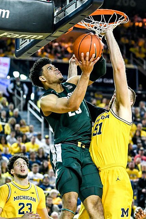 Brandon Johns Jr. (23) and Austin Davis (51)