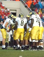 Chad Henne (7), Jason Avant (8), and Rueben Riley (72)