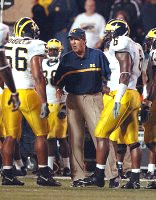 LaMarr Woodley (56), Prescott Burgess (6), and Lloyd Carr