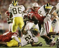 Max Martin (23), Matt Lentz (67), and Mario Manningham (86)