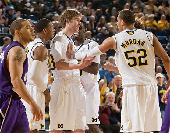Darius Morris (4), Evan Smotrycz (23), Tim Hardaway Jr. (10), and Jordan Morgan (52)