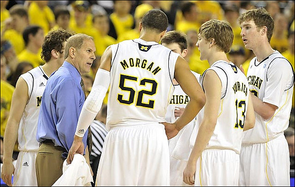 Zack Novak (0), John Beilein, Jordan Morgan (52),  Matt Vogrich (13), Evan Smotrycz (23), and Stu Douglass (1)