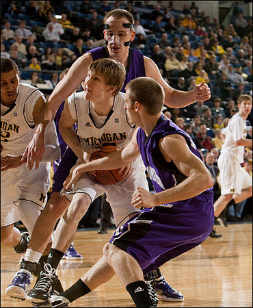 Jordan Morgan (52), Matt Vogrich (13), and Evan Smotrycz (23)