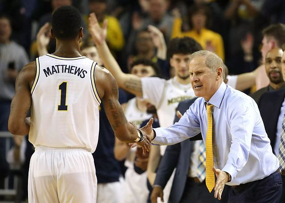 Charles Matthews (1) and John Beilein