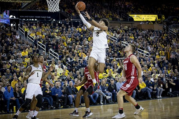Charles Matthews (1) and Jordan Poole (2)