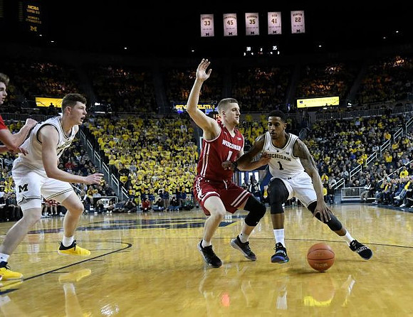 Jon Teske (15) and Charles Matthews (1)