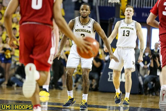 Zavier Simpson (3) and Ignas Brazdeikis (13)